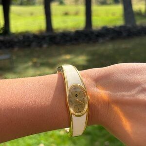 Elegant Gold and White Watch